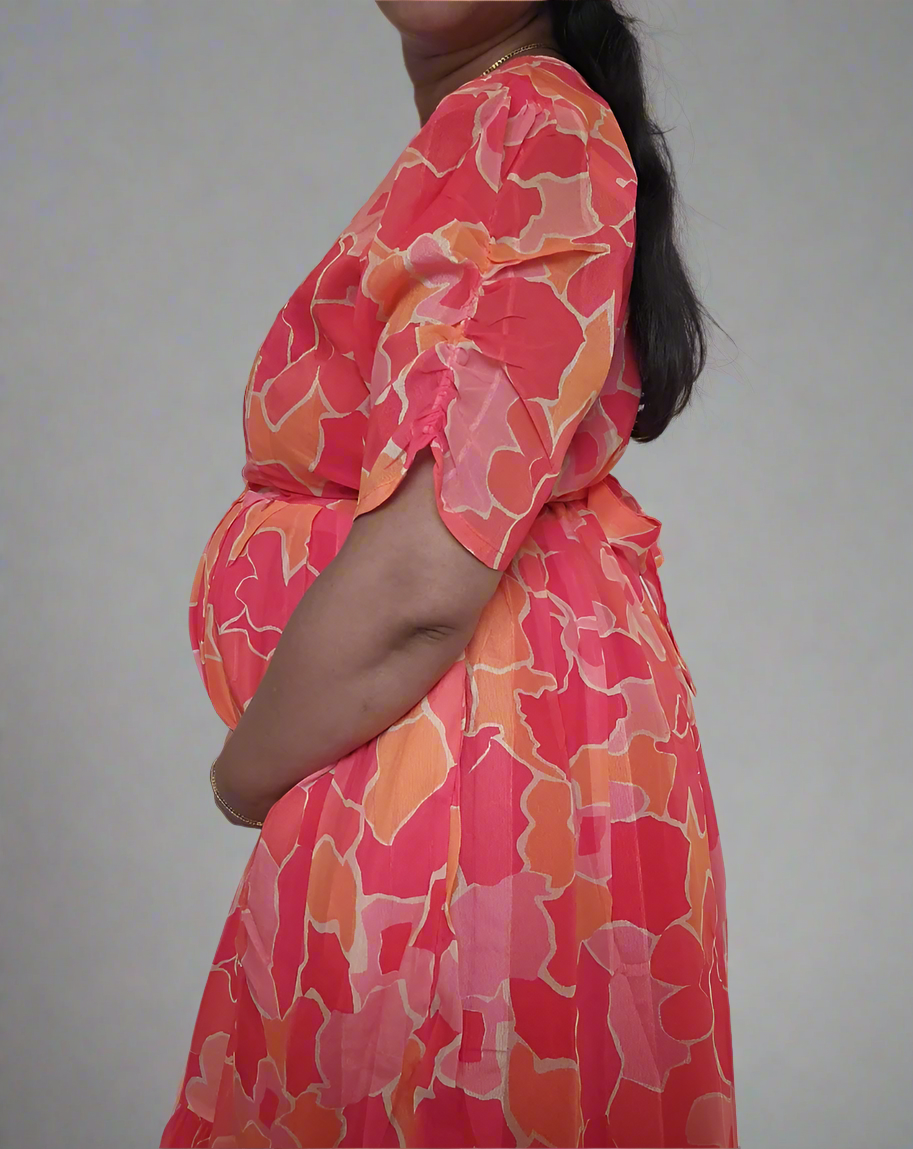 pink and orange maternity dress ASOS DESIGN Maternity knit maxi dress with twist front in color block in pink & orange
